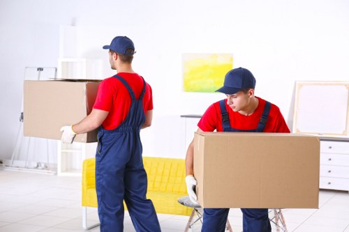 Team assessing a moving job with careful planning and precautions