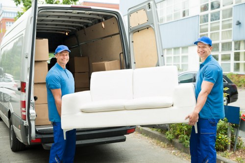Professional movers assisting with a home move in Romford