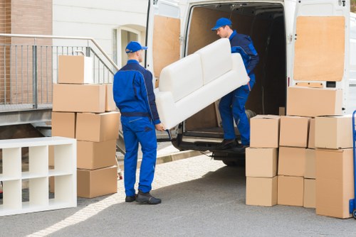 Local van service loading furniture for transport in Romford