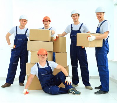 Removal van handling apartment access and furniture transport in Romford