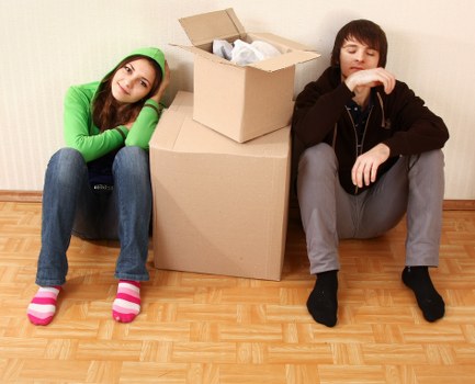 Organised moving boxes and labelled contents for a home in Romford