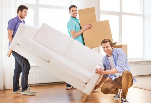 Cleanly arranged moving supplies and unpacked essentials in a Romford property