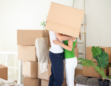 Packed furniture and boxes loaded into a moving truck