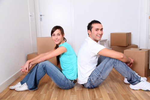 Furniture and boxes being loaded for transport in Romford