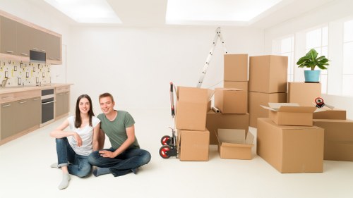 Romford home moving service with boxes and furniture for delivery