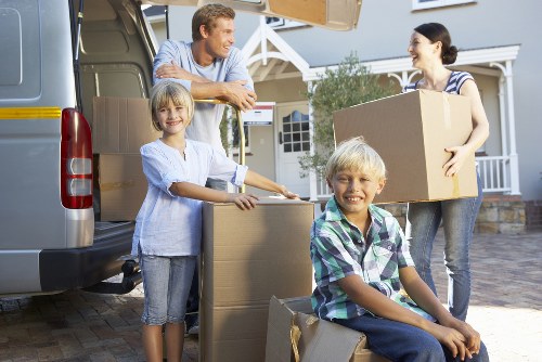 Packed boxes and furniture ready for transport in Romford